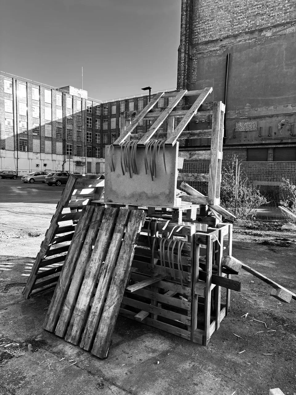 Shelter, Wood pallets, Variable dimensions, 2025 by Paul Tymoshenko